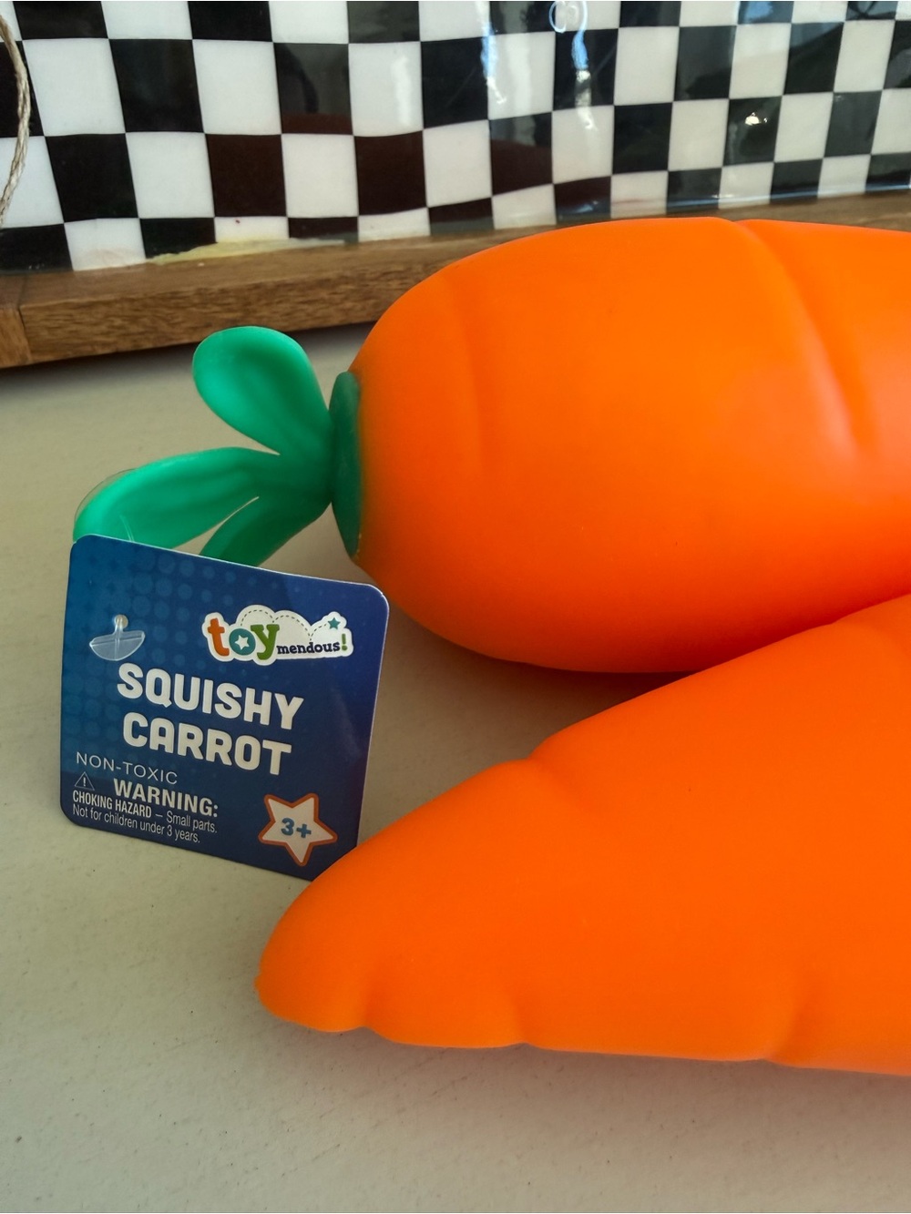 Squishy Carrot Toy - Bright Orange with Green Top - Picture 2 of 3